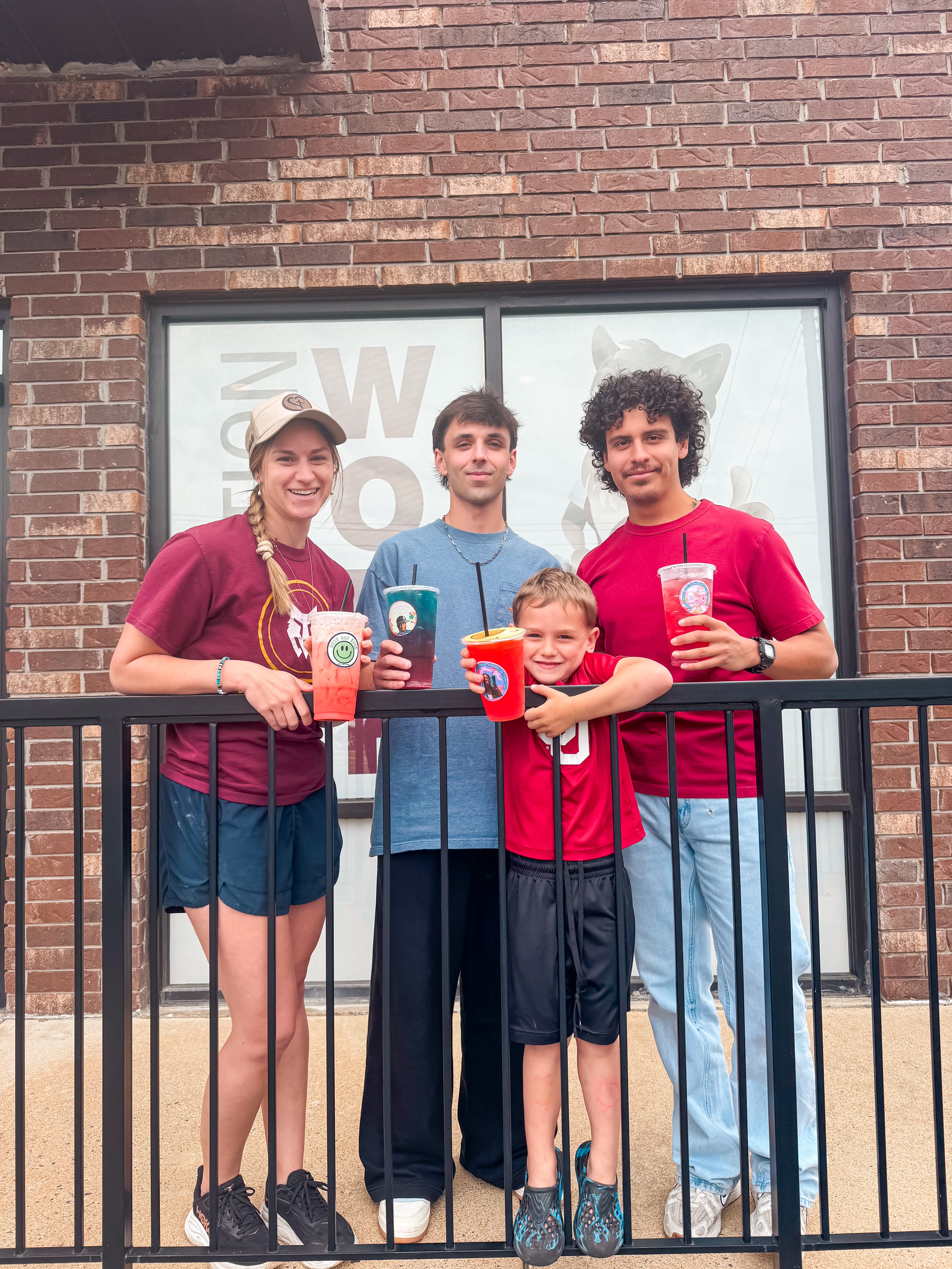 Family of four outside Wolf Nutrition